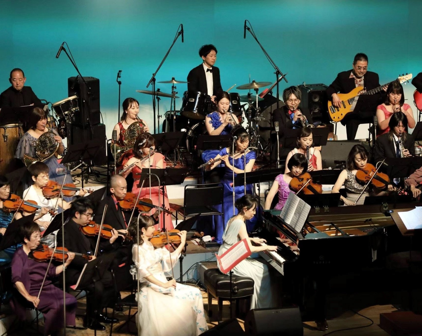 多彩な名曲をオリジナル編曲で披露する定期演奏会（２０２３年、高知市の市文化プラザ「かるぽーと」）